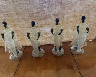 $1500 Set of four Murano glass blackamore figures. Crackle, clear, frosted and gold. One figure has a staple repair on her arm. Approx. 15"h.