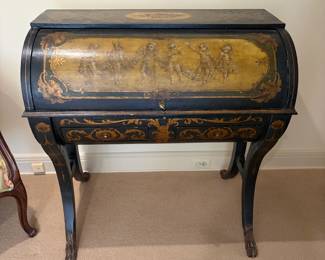 Antique roll top hand-painted desk. 37 inches wide by 19 inches deep by 29 1/2 inches high.