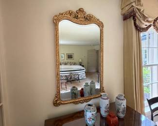 Antique gilt mirror. 25 inches wide by 48 inches high