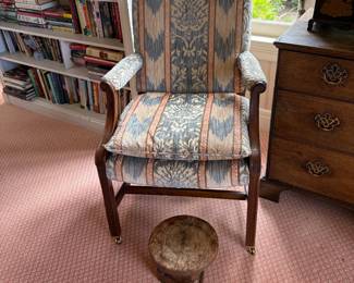 Antique library chair with wooden footstool is 24.5 inches wide by 22 inches deep by 38 inches high.