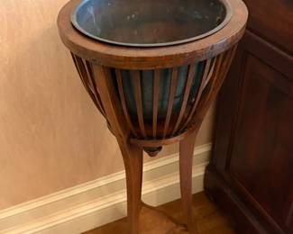 $600 Pair of English Regency mahogany plant stands. 14 inch diameter by 33 1/2 inches high.