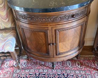 $680. Antique demi-lune chest with a marble top, one drawer above doors. 40"w x 21"d x 37"h.