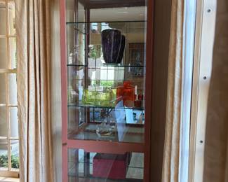 Pair of Laqueur display cabinets with interior lighting and exterior control for easy use. 30 inches wide by 14 inches deep by 91 inches high.
