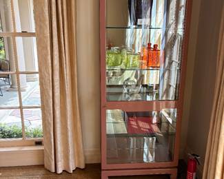 $600. Pair of Laqueur display cabinets with interior lighting. Each is 30 inches wide by 14 inches deep by 91 inches high.