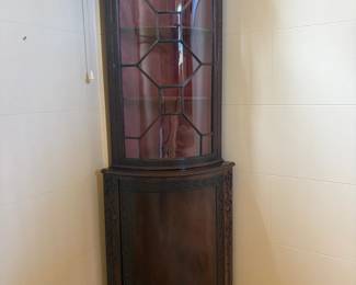 Antique Georgian style corner cabinet. 32" w x 18"d x 81"h.