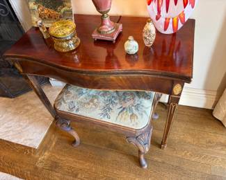 $450. Elegant gilt flip top games console. 35.5 "w x 18.5"d x 27.5'h.