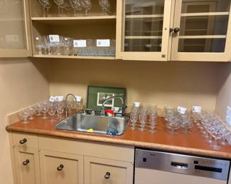 Glassware for sale during in-person shopping.