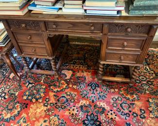 Antique barley twist carved detailing desk. 49 inches wide by 28 inches deep by 30 1/2 inches high.