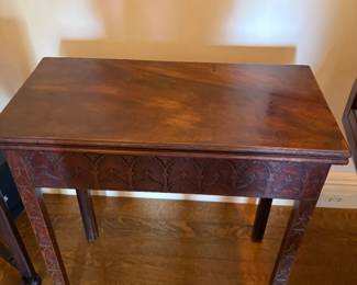 $600. Antique carved apron flip top table. 30 inches wide by 15 inches deep by 29 inches high 30 in.² when top is opened up.