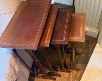 $160. Set of four nesting tables. Outer dimensions of the largest table are 19"w x 11" x 24"h. as found - smallest is slightly lighter in color.