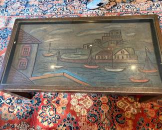 Hand painted and carved river scene topped coffee table. 43 1/2 inches wide by 23 inches deep by 17 inches high.