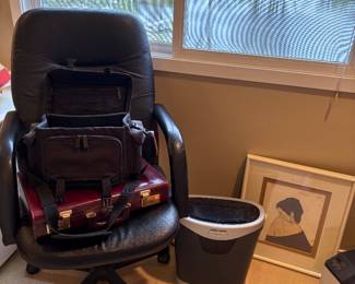 office chair, Camera case and Camera, shredder, and briefcase