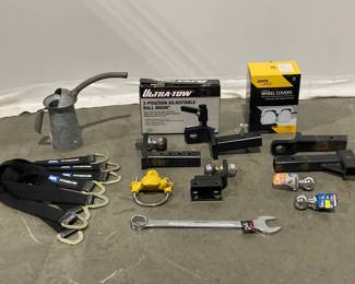Lot 5255  Tow Hitches Balls Wrench Mac Straps Wheel Covers More