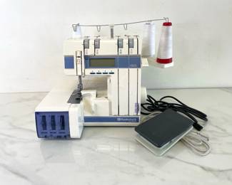 Lot 6058  Husqvarna Viking Huskylock 1001L Serger Machine  Sewing
