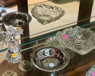 Various Swarovski figures, dishes and silverplate bowl. $5.00 to $25.00