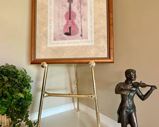 Framed violin artwork, brass artwork easel