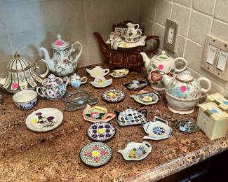 Teapots ($10.00 to $25.00 each), teapot form dishes ($1.00 to $5.00 each)