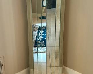 Mirrored display pedestal. $100.00