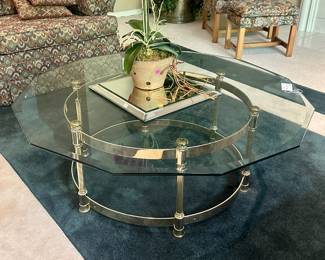 Brass and glass coffee table. $350.00