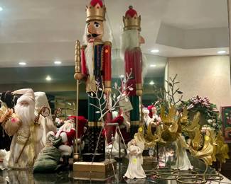 Santa figures, nutcracker, decorations. $5.00 to $25.00