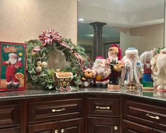 Santa figures, decorations. $10.00 to $25.00