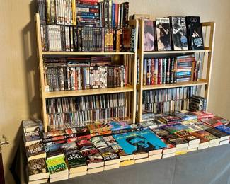 Hardcover books, DVDs ($2.00 each), paperback books, CD's, VHS tapes ($1.00 each)