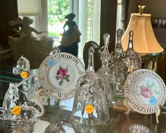 Swarovski Crystal figures ($10.00 each), reticulated porcelain tableware ($5.00 each)