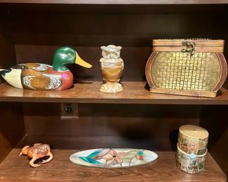Painted wood decorative mallard decoy ($10.00), Imperial slag glass owl jar ($25.00), decorative box ($10.00), frog figure ($5.00), resin stained glass panel ($5.00), Mexican travel candle ($5.00)