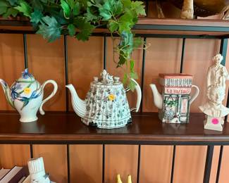 Porcelain teapots ($25.00 each), molded bust and figure ($10.00 each)