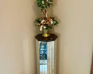 Mirrored display pedestal ($100.00), decorative faux topiary ($25.00)