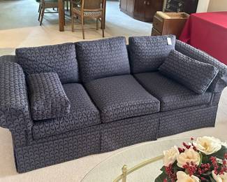 Dark blue upholstered sofa. $250.00