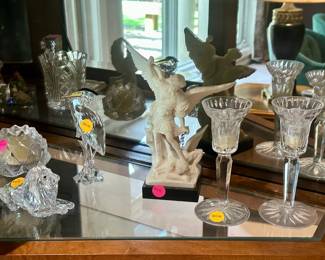 Angel figure ($10.00), Swarovski Crystal figures and glass candlesticks ($10.00 to $25.00)