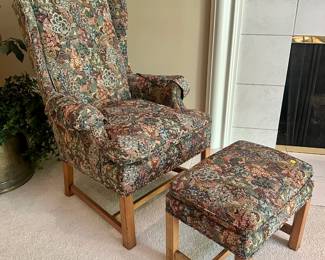 Upholstered armchair and matching stool. $25.00 each