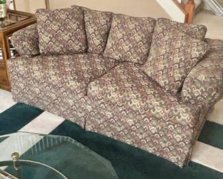 Love seat with patterned upholstery. $150.00