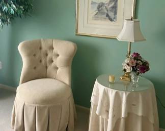 Upholstered slipper chair ($25.00), framed artwork ($25.00)