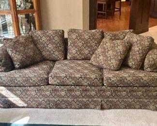 Sofa with patterned upholstery. $200.00
