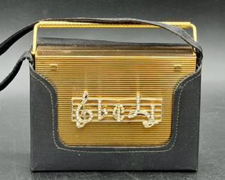 1940s-1950s Volupté "Swinglok" musical compact and purse