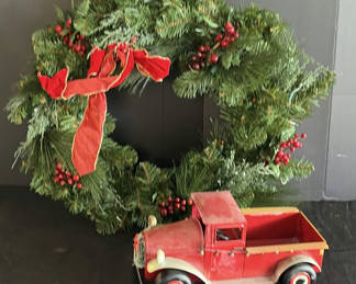 Lot 187: Christmas wreath with vintage red toy truck