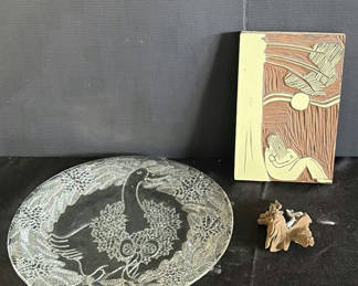 Lot 128: Round etched glass plate with crane motif and wooden relief plaque; small wood sculpture