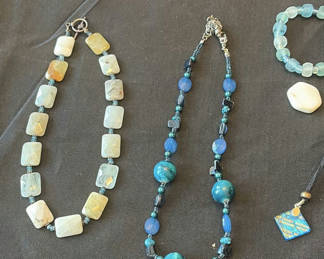 Lot 200: Assorted blue jewelry set (necklaces, bracelets, earrings, and pendants)