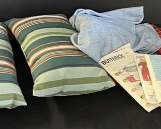 Lot 111: Cushions, sewing patterns, and yarn craft supplies