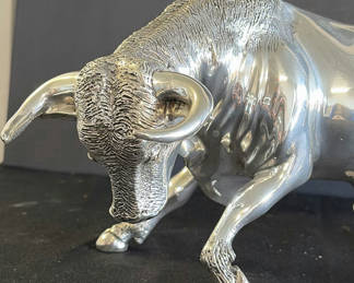 Lot 97: Polished chrome bull sculpture