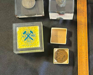 Lot 92: Collection of mining-related coins and medals in display cases