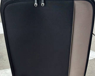 Lot 140: Travelpro rolling suitcase with multiple compartments