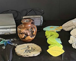 Lot 120: Assorted home decor items including glass sculptures, pottery, and textiles