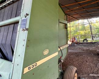 This baler is in good shape . Has been under a barn 