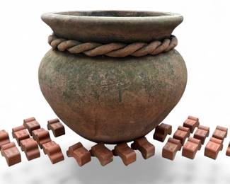 Oversize terracotta planter with pot feet
