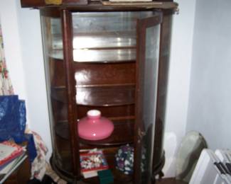ANOTHER CURVED GLASS CABINET