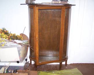 CURVED GLASS CHINA CABINET--WE HAVE THE SHELVES