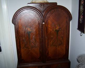 ONE OF A PAIR OF 1920s BLIND DOOR CHINA CABINETS